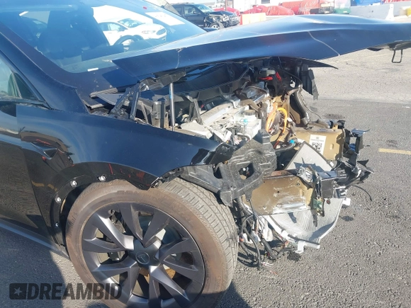 2023 Tesla Model X with VIN 7SAXCDE59PF430836, listed as a IAAI auction lot 41545267 with Not Provided miles and . Bid and sale history available at DreamBid. Image 6.