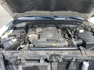 2006 Nissan Frontier SE with VIN 1N6AD07U36C427811, listed as a Copart auction lot 57865725 with 151,598 mi miles and Salvage title. Bid and sale history available at DreamBid. Image 11.