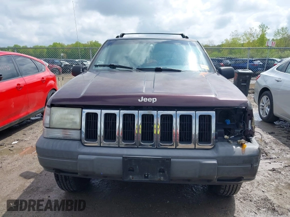 1997 Jeep Grand Cherokee Laredo with VIN 1J4GZ58S4VC702040, listed as a IAAI auction lot 42165536 with 121,803 mi miles and . Bid and sale history available at DreamBid. Image 13.