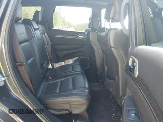2017 Jeep Grand Cherokee Summit with VIN 1C4RJFJT9HC759417, listed as a IAAI auction lot 42199460 with 129,113 mi miles and . Bid and sale history available at DreamBid. Image 8.