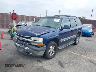 2003 Chevrolet Tahoe LS z VIN 1GNEC13T73R263893, wystawiony jako IAAI lot #41906772 z przebiegiem 211 759 mil mil oraz . Historia ofert i sprzedaży dostępna na DreamBid. Obrazek 2.