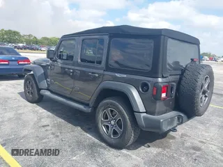 2018 Jeep Wrangler Unlimited Sport S z VIN 1C4HJXDGXJW165312, wystawiony jako IAAI lot #42095590 z przebiegiem 90 598 mil mil oraz . Historia ofert i sprzedaży dostępna na DreamBid. Obrazek 3.