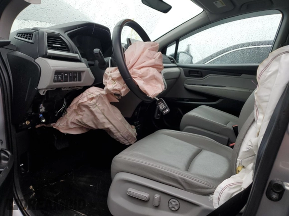 2019 Honda Odyssey EX-L with VIN 5FNRL6H77KB122457, listed as a Copart auction lot 42988715 with 62,444 mi miles and Salvage Title. Bid and sale history available at carsss.com. Image 7.