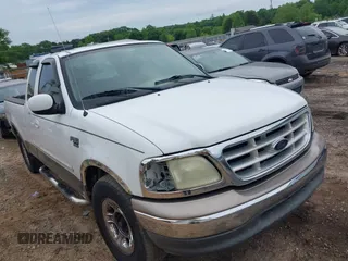 2003 Ford F-150 XL with VIN 1FTRX17L63NA96992, listed as a IAAI auction lot 42216908 with 328,976 mi miles and . Bid and sale history available at DreamBid. Image 1.