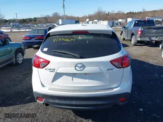 2016 Mazda CX-5 Touring with VIN JM3KE4CYXG0917841, listed as a IAAI auction lot 41420641 with 75,710 mi miles. Bid and sale history available at carsss.com. Image 16.