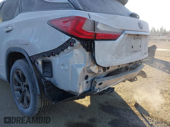 2018 Lexus RX 350L Premium z VIN JTJDZKCAXJ2008164, wystawiony jako IAAI lot #41436168 z przebiegiem 126 798 mil mil oraz . Historia ofert i sprzedaży dostępna na DreamBid. Obrazek 19.