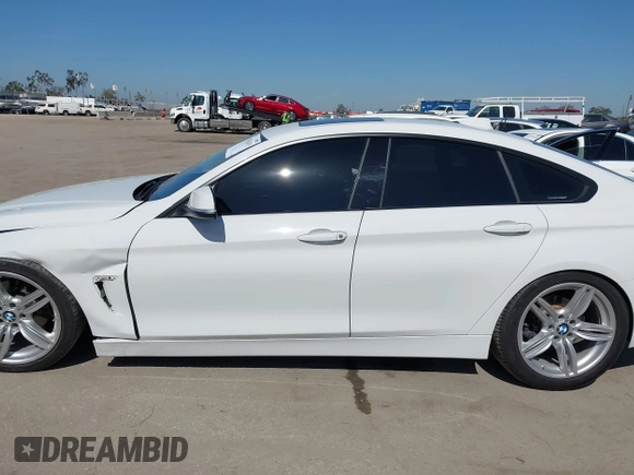 2015 BMW 4 Series 428i with VIN WBA4A9C50FGL85857, listed as a IAAI auction lot 42542619 with 136,411 mi miles and . Bid and sale history available at DreamBid. Image 15.