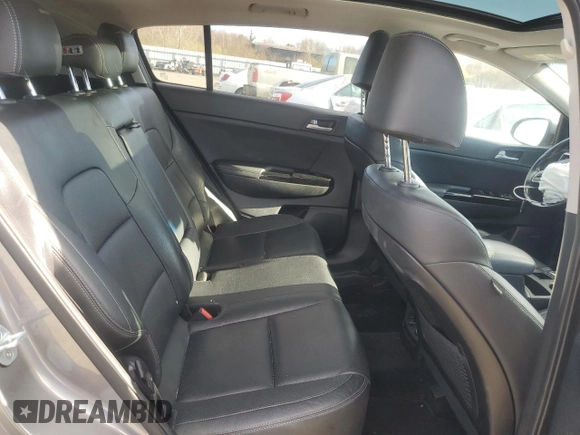 2018 Kia Sportage EX z VIN KNDPNCAC1J7308457, wystawiony jako Copart lot #81574704 z przebiegiem Nie podano mil oraz Szkoda całkowita • Salvage title. Historia ofert i sprzedaży dostępna na DreamBid. Obrazek 11.