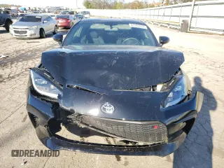 2023 Toyota GR86 with VIN JF1ZNBB12P9763031, listed as a Copart auction lot 81593314 with 7,411 mi miles and Salvage Title. Bid and sale history available at carsss.com. Image 5.