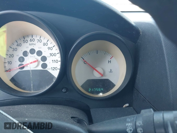 2008 Dodge Caliber SE with VIN 1B3HB28B88D677348, listed as a IAAI auction lot 42130383 with 217,564 mi miles. Bid and sale history available at carsss.com. Image 7.