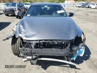 2020 Infiniti Q50 Red Sport 400 with VIN JN1FV7ARXLM660161, listed as a Copart auction lot 54141115 with 78,476 mi miles and Salvage title. Bid and sale history available at DreamBid. Image 5.