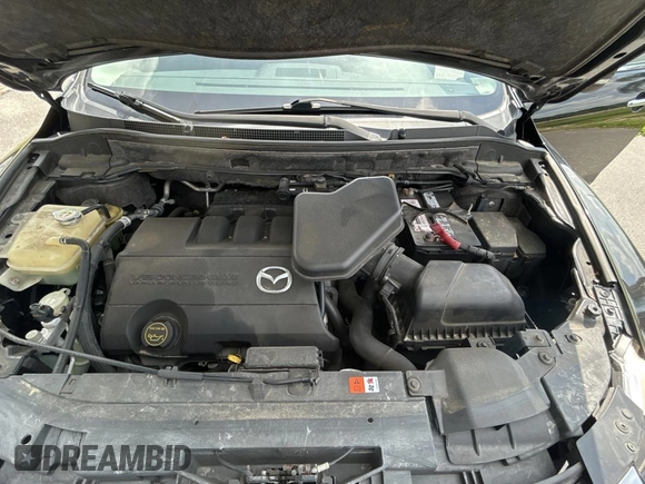 2012 Mazda CX-9 Grand Touring with VIN JM3TB2DA0C0350679, listed as a Copart auction lot 59038715 with 145,135 mi miles and Clean title. Bid and sale history available at DreamBid. Image 7.