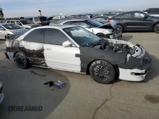1998 Acura Integra LS with VIN JH4DB7655WS006377, listed as a Copart auction lot 42187355 with 165,638 mi miles and Salvage title. Bid and sale history available at DreamBid. Image 4.
