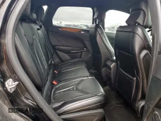 2016 Lincoln MKC Select z VIN 5LMCJ2C95GUJ27886, wystawiony jako Copart lot #60280645 z przebiegiem 165 973 mil mil oraz Szkoda całkowita • Salvage title. Historia ofert i sprzedaży dostępna na DreamBid. Obrazek 11.