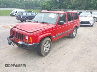 1999 Jeep Cherokee Sport z VIN 1J4FT68S9XL667355, wystawiony jako IAAI lot #42204435 z przebiegiem 217 178 mil mil oraz . Historia ofert i sprzedaży dostępna na DreamBid. Obrazek 2.
