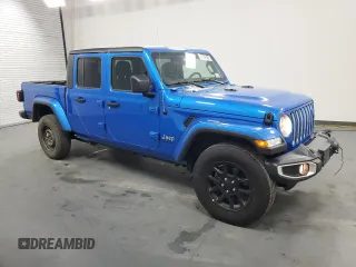 2023 Jeep Gladiator Overland z VIN 1C6HJTFG6PL564337, wystawiony jako Copart lot #59620315 z przebiegiem 31 552 mil mil oraz Czysty tytuł • Clean title. Historia ofert i sprzedaży dostępna na DreamBid. Obrazek 4.
