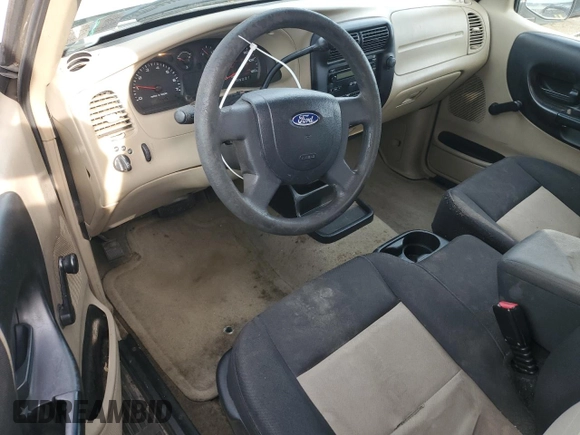 2005 Ford Ranger XL z VIN 1FTYR14U45PA11478, wystawiony jako Copart lot #58513715 z przebiegiem 174 545 mil mil oraz Czysty tytuł • Clean title. Historia ofert i sprzedaży dostępna na DreamBid. Obrazek 8.