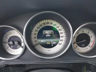 2014 Mercedes-Benz E 550 Sport with VIN WDDHF9BBXEA940995, listed as a IAAI auction lot 41872452 with 50,451 mi miles and . Bid and sale history available at DreamBid. Image 7.