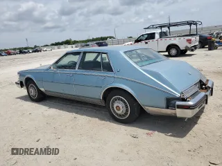 1985 Cadillac Seville z VIN 1G6KS6985FE825187, wystawiony jako Copart lot #54197375 z przebiegiem 2706 mil mil oraz Tytuł czysty. Historia ofert i sprzedaży dostępna na DreamBid. Obrazek 2.