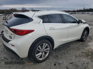2018 Infiniti QX30 Premium with VIN SJKCH5CP3JA057376, listed as a Copart auction lot 82438634 with 47,412 mi miles and Salvage title. Bid and sale history available at DreamBid. Image 3.