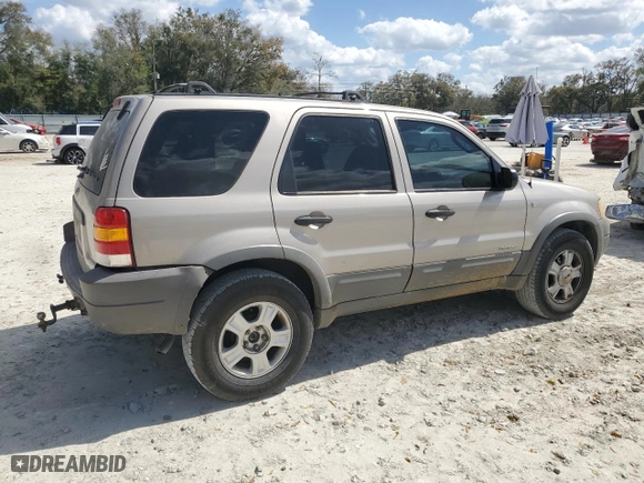 2001 Ford Escape XLT with VIN 1FMYU04141KB50947, listed as a Copart auction lot 47617995 with 132,962 mi miles and Salvage Title. Bid and sale history available at carsss.com. Image 3.