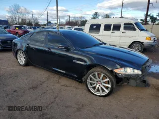 2015 Jaguar XJ Portfolio with VIN SAJWJ2GD2F8V76289, listed as a Copart auction lot 48222815 with 95,420 mi miles and Salvage title. Bid and sale history available at DreamBid. Image 4.