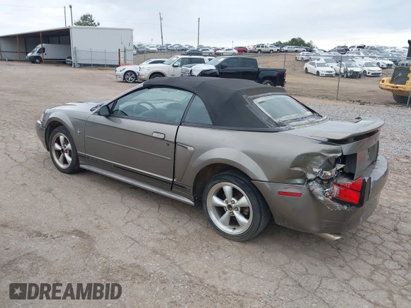 2001 Ford Mustang Deluxe z VIN 1FAFP44411F159656, wystawiony jako IAAI lot #42123128 z przebiegiem 191 814 mil mil oraz . Historia ofert i sprzedaży dostępna na DreamBid. Obrazek 3.