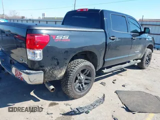 2013 Toyota Tundra 4WD Truck with VIN 5TFDW5F12DX309382, listed as a IAAI auction lot 41631661 with 158,821 mi miles. Bid and sale history available at carsss.com. Image 4.