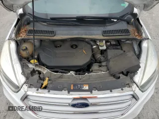 2017 Ford Escape SE z VIN 1FMCU0G99HUA75866, wystawiony jako Copart lot #57274785 z przebiegiem 132 874 mil mil oraz Czysty tytuł • Clean title. Historia ofert i sprzedaży dostępna na DreamBid. Obrazek 12.