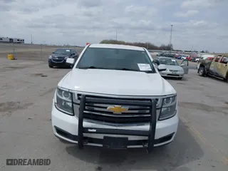 2020 Chevrolet Tahoe Commercial with VIN 1GNSKDEC9LR260983, listed as a IAAI auction lot 42062097 with 124,911 mi miles. Bid and sale history available at carsss.com. Image 12.