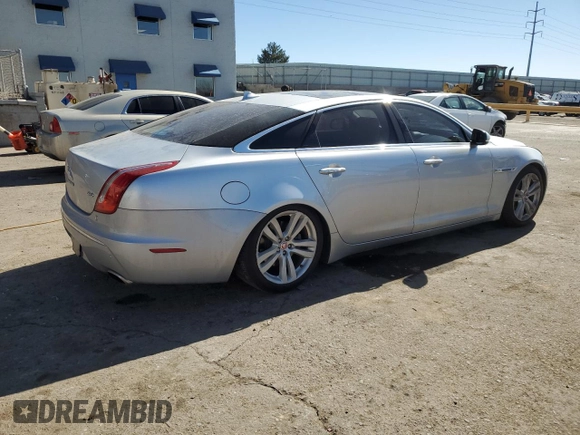 2014 Jaguar XJ Portfolio with VIN SAJWA2GZ2E8V70065, listed as a Copart auction lot 43872505 with 138,677 mi miles and Salvage title. Bid and sale history available at DreamBid. Image 3.