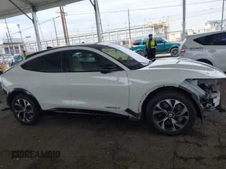 2021 Ford Mustang Mach-E Premium с VIN 3FMTK3SU6MMA27937, выставлен на аукционе IAAI как лот 42033076 с пробегом 90 743 миль миль и . История ставок и продаж доступна на DreamBid. Изображение 14.