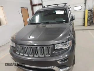2015 Jeep Grand Cherokee Summit with VIN 1C4RJFJT6FC754799, listed as a IAAI auction lot 41699124 with 124,206 mi miles and . Bid and sale history available at DreamBid. Image 12.