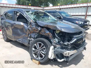 2021 Honda CR-V EX-L with VIN 2HKRW1H87MH410695, listed as a IAAI auction lot 42707347 with 19,345 mi miles and . Bid and sale history available at DreamBid. Image 1.