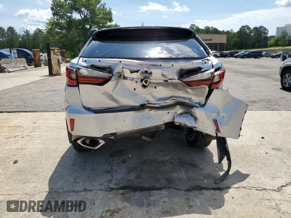 2018 Lexus RX 350 with VIN JTJBZMCA1J2034266, listed as a Copart auction lot 59900105 with 44,171 mi miles and Salvage title. Bid and sale history available at DreamBid. Image 6.