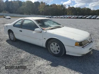 1993 Ford Thunderbird LX z VIN 1FAPP62T6PH189176, wystawiony jako Copart lot #78146094 z przebiegiem 107 514 mil mil oraz Szkoda całkowita • Salvage title. Historia ofert i sprzedaży dostępna na DreamBid. Obrazek 4.