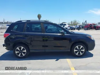 2017 Subaru Forester with VIN JF2SJABCXHH578835, listed as a IAAI auction lot 42695831 with 146,908 mi miles and . Bid and sale history available at DreamBid. Image 14.