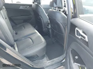 2023 Kia Sportage Hybrid EX with VIN KNDPVCAGXP7084083, listed as a IAAI auction lot 41311190 with 16,064 mi miles. Bid and sale history available at carsss.com. Image 8.