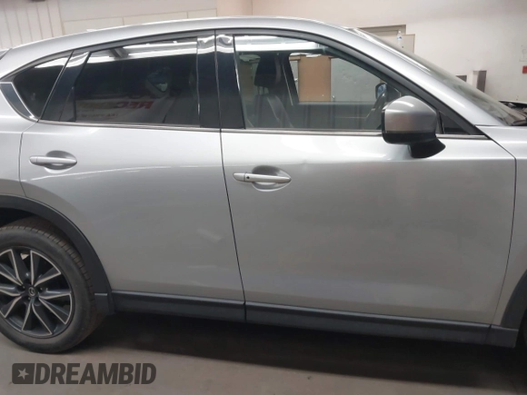 2018 Mazda CX-5 Grand Touring with VIN JM3KFBDM7J0316892, listed as a IAAI auction lot 41885705 with 90,386 mi miles. Bid and sale history available at carsss.com. Image 14.