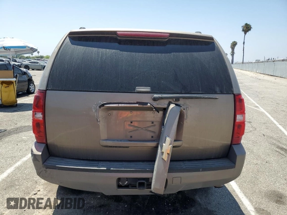 2007 Chevrolet Tahoe LS with VIN 1GNFC13J47R151058, listed as a Copart auction lot 60741285 with 210,749 mi miles and Salvage title. Bid and sale history available at DreamBid. Image 6.