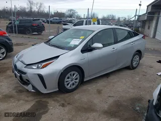 2019 Toyota Prius L Eco with VIN JTDKARFU4K3079789, listed as a IAAI auction lot 41897586 with 93,593 mi miles. Bid and sale history available at carsss.com. Image 2.