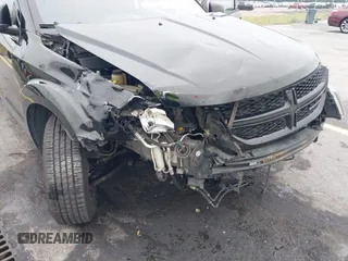 2017 Dodge Journey SE z VIN 3C4PDCABXHT683196, wystawiony jako IAAI lot #42340532 z przebiegiem 170 173 mil mil oraz . Historia ofert i sprzedaży dostępna na DreamBid. Obrazek 6.
