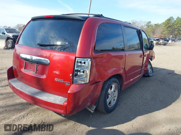 2009 Dodge Grand Caravan SE with VIN 2D8HN44E79R673244, listed as a IAAI auction lot 41913383 with 121,895 mi miles and . Bid and sale history available at DreamBid. Image 4.