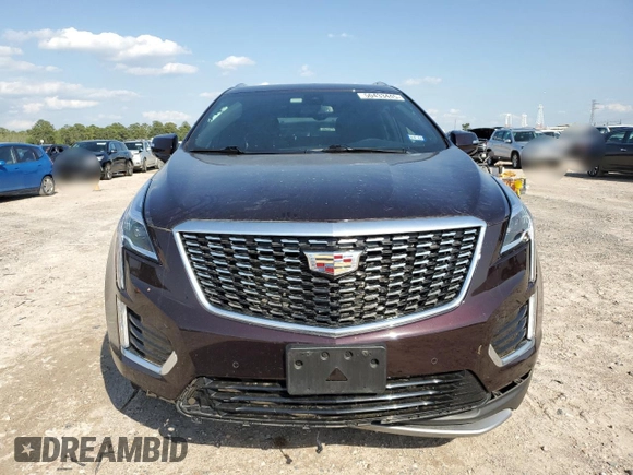 2021 Cadillac XT5 FWD Premium Luxury with VIN 1GYKNCRS2MZ180884, listed as a Copart auction lot 50433445 with 27,246 mi miles and Salvage Title. Bid and sale history available at carsss.com. Image 5.