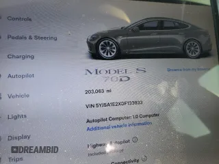 2016 Tesla Model S 90D with VIN 5YJSA1E2XGF133933, listed as a Copart auction lot 60736445 with 203,063 mi miles and Salvage title. Bid and sale history available at DreamBid. Image 9.
