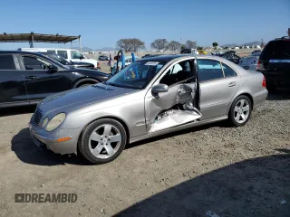 2003 Mercedes-Benz E-Class 5.0L with VIN WDBUF70J43A141846, listed as a Copart auction lot 49706765 with 199,428 mi miles and Salvage Title. Bid and sale history available at carsss.com. Image 1.