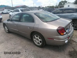 2001 Oldsmobile Aurora with VIN 1G3GS64C514111797, listed as a IAAI auction lot 42230811 with Not Provided miles and . Bid and sale history available at DreamBid. Image 3.