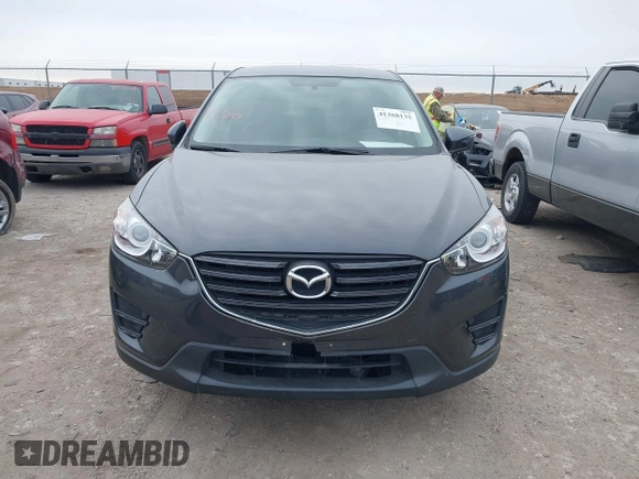 2016 Mazda CX-5 Sport with VIN JM3KE2BY4G0858100, listed as a IAAI auction lot 41368135 with 93,435 mi miles. Bid and sale history available at carsss.com. Image 12.