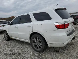 2013 Dodge Durango R/T with VIN 1C4SDHCT0DC648668, listed as a Copart auction lot 83211194 with 149,649 mi miles and Salvage title. Bid and sale history available at DreamBid. Image 2.