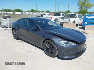 2021 Tesla Model S Plaid with VIN 5YJSA1E61MF435321, listed as a IAAI auction lot 41832006 with 23,361 mi miles. Bid and sale history available at carsss.com. Image 1.